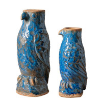 Vase bleu perroquet, Chehoma