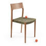 Chaise empilable en teck Buco, Manufactori
