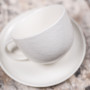 Tasse et sous-tasse à thé Ecume, Table Passion